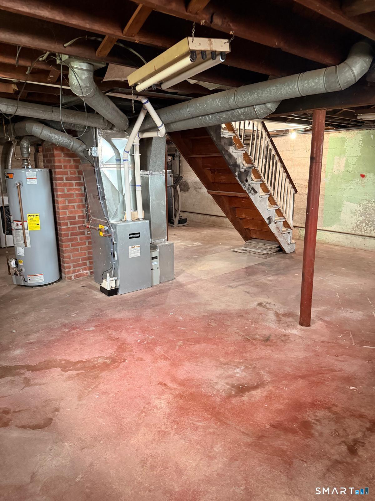 44 Lynmoor Place Hamden, CT 06517 - Photo 25 of 30 a view of water heater room with stairs