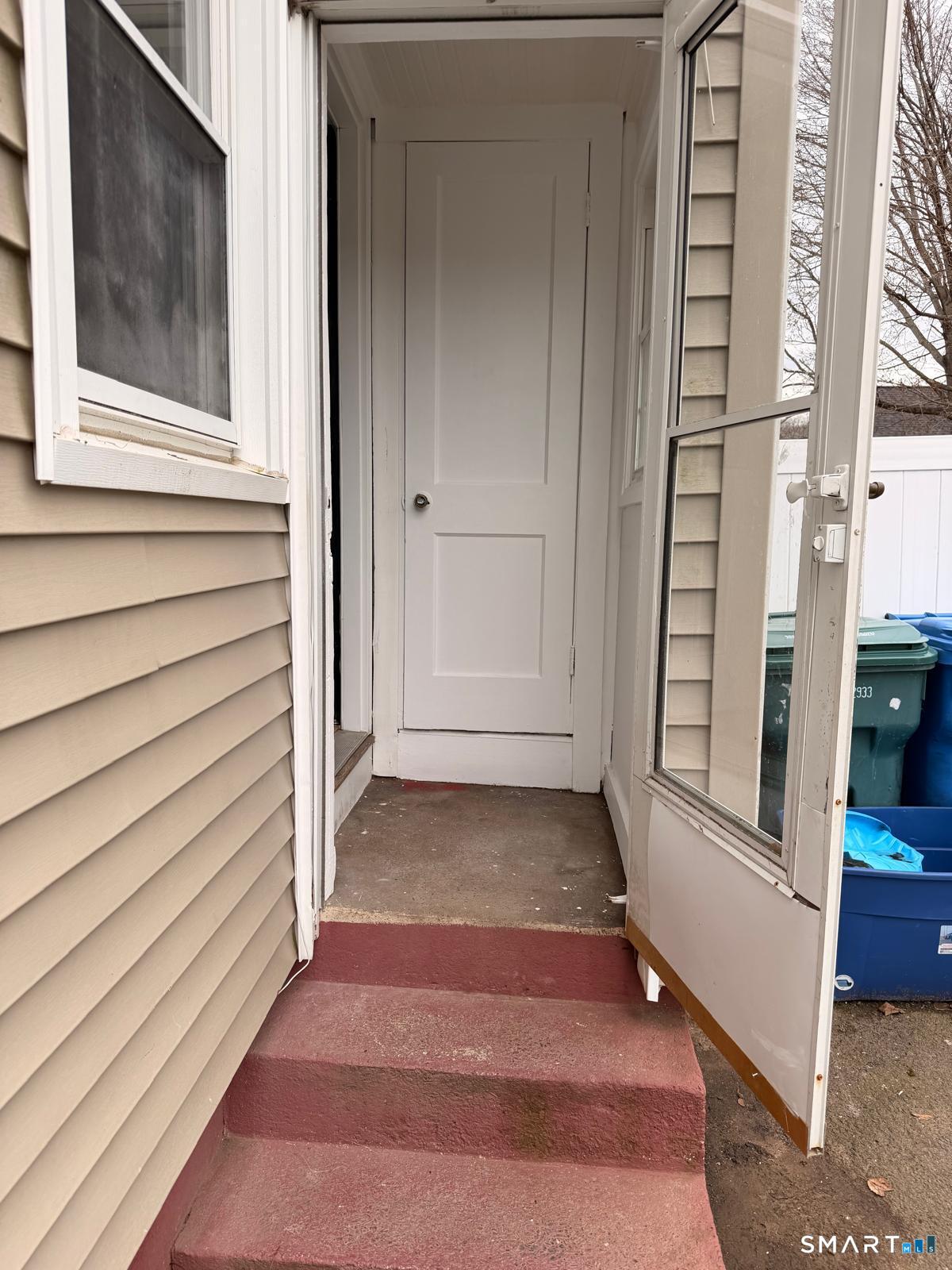 44 Lynmoor Place Hamden, CT 06517 - Photo 5 of 30 a view of front door of house
