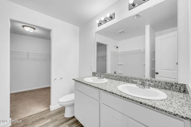 a view of kitchen with wooden floor