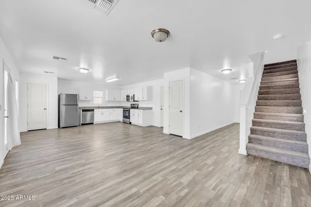 a picture of a bathroom with a shower