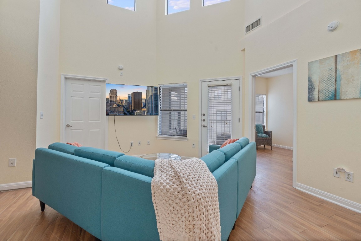 2502 Leon Street, Unit 501 Austin, TX 78705 - Photo 3 of 14 Living area featuring wood finished floors