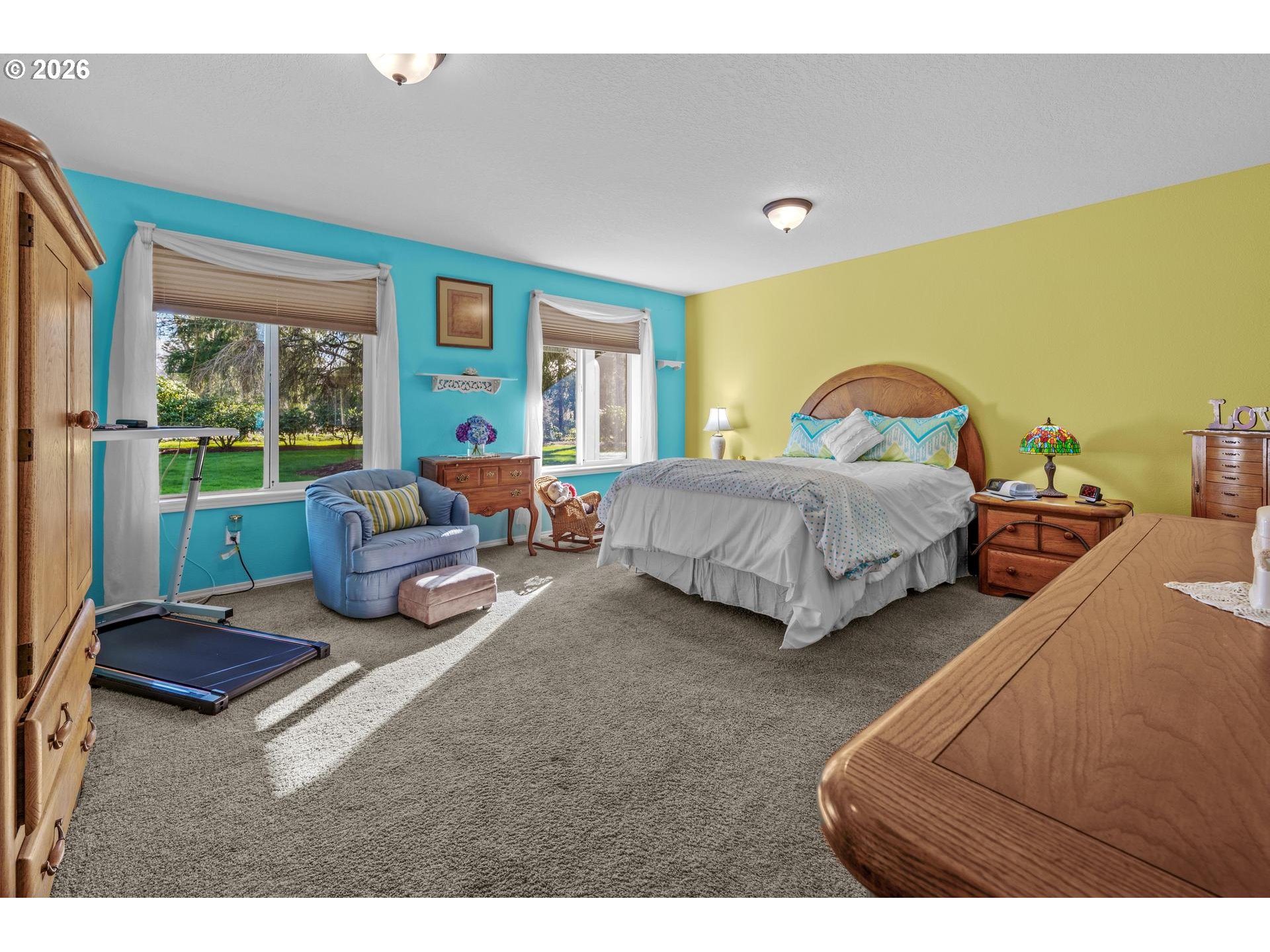 33261 Filbert Lane Warren, OR 97053 - Photo 17 of 35 a spacious bedroom with a bed window and couch