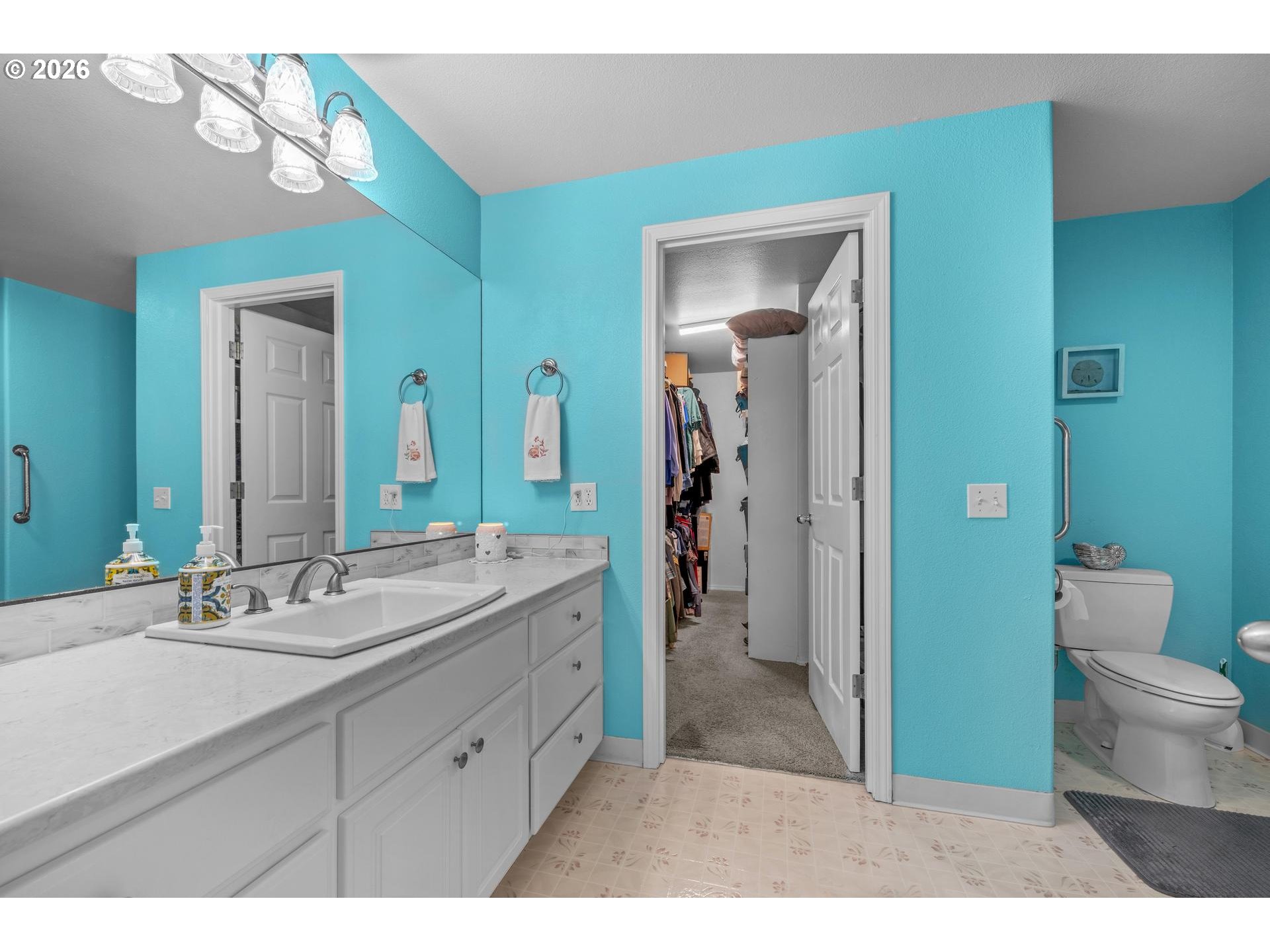 33261 Filbert Lane Warren, OR 97053 - Photo 19 of 35 a bathroom with a double vanity sink and a mirror