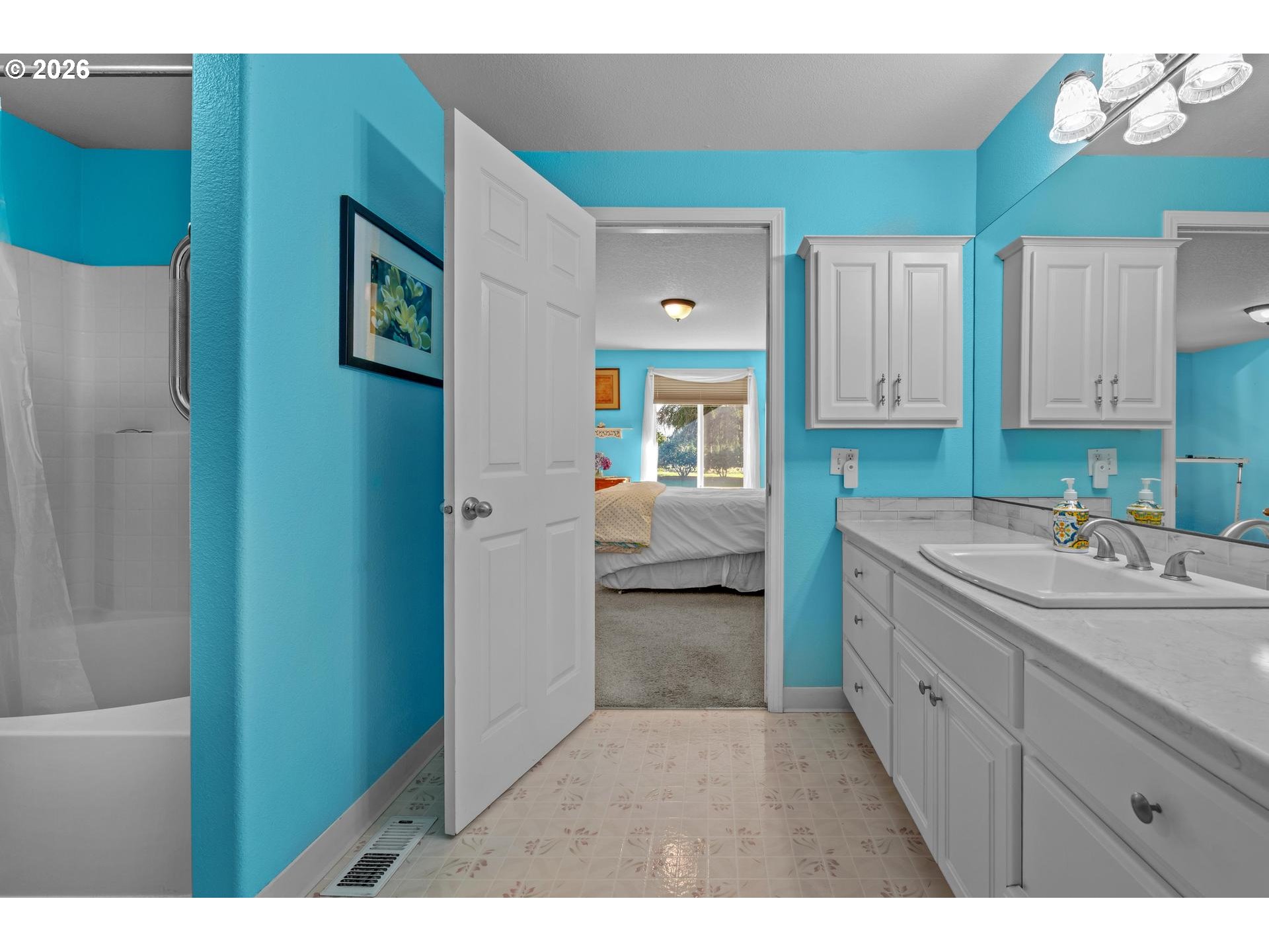33261 Filbert Lane Warren, OR 97053 - Photo 20 of 35 a en suite bathroom with a sink and a mirror