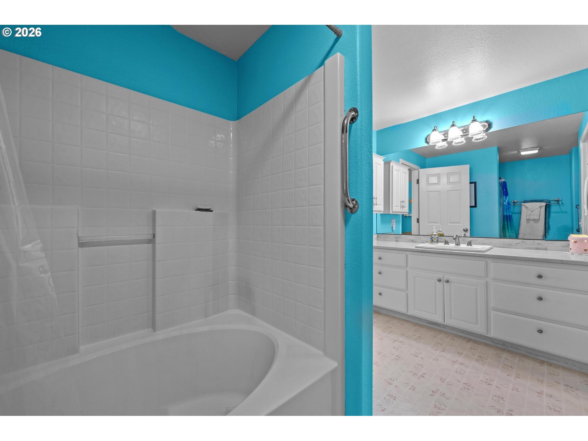 33261 Filbert Lane Warren, OR 97053 - Photo 21 of 35 a bathroom with a sink mirror and a bathtub