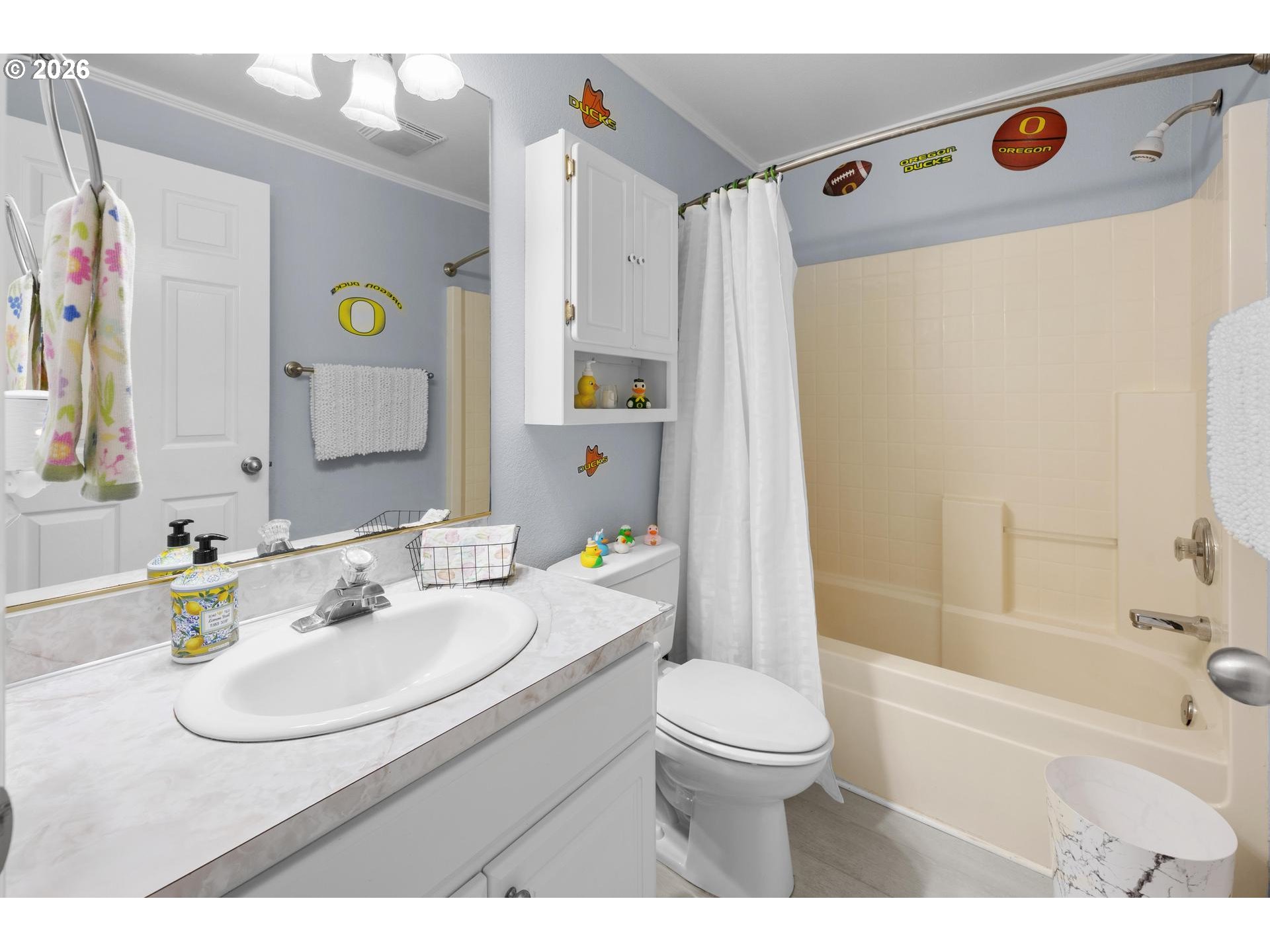 33261 Filbert Lane Warren, OR 97053 - Photo 23 of 35 a bathroom with a sink mirror vanity and toilet