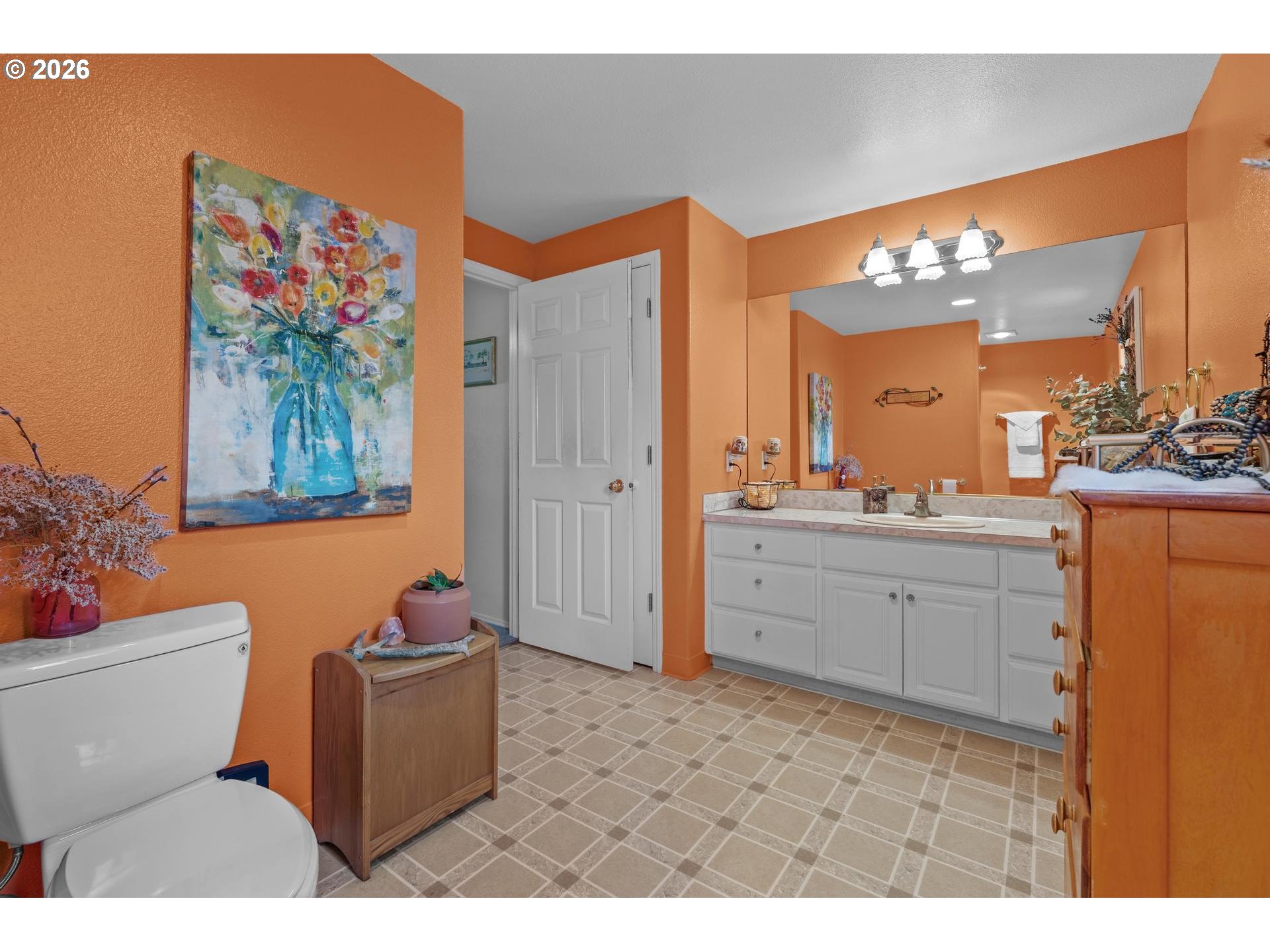 33261 Filbert Lane Warren, OR 97053 - Photo 27 of 35 a bathroom with a toilet a sink and a mirror