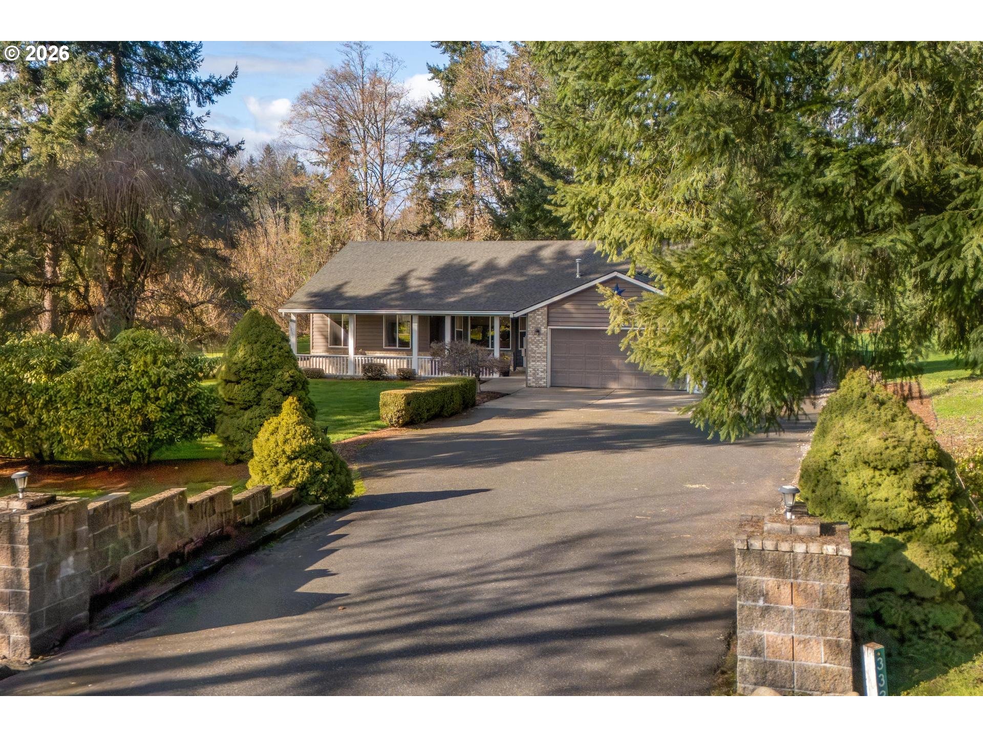 33261 Filbert Lane Warren, OR 97053 - Photo 4 of 35 a front view of a house with a yard