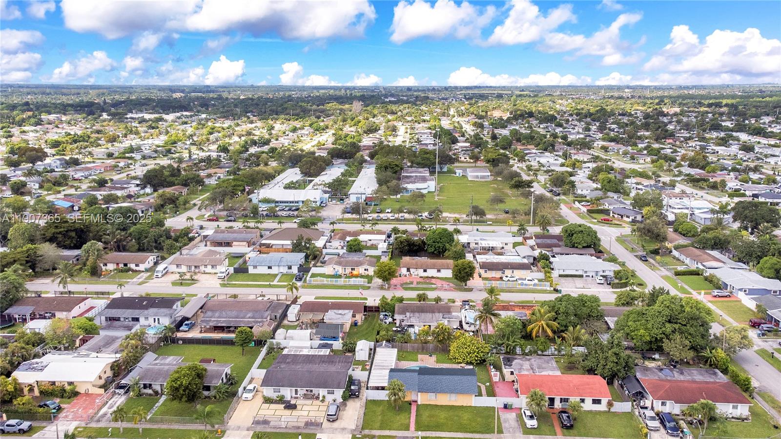 18922 Southwest 120th Court Miami, FL 33177 - Photo 21 of 29 an aerial view of residential houses with outdoor space