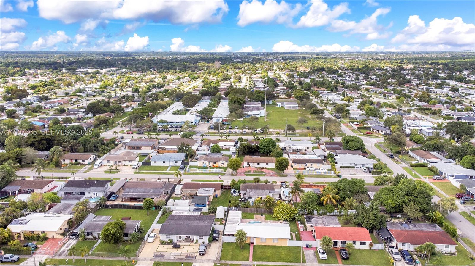 18922 Southwest 120th Court Miami, FL 33177 - Photo 27 of 29 an aerial view of residential houses with outdoor space