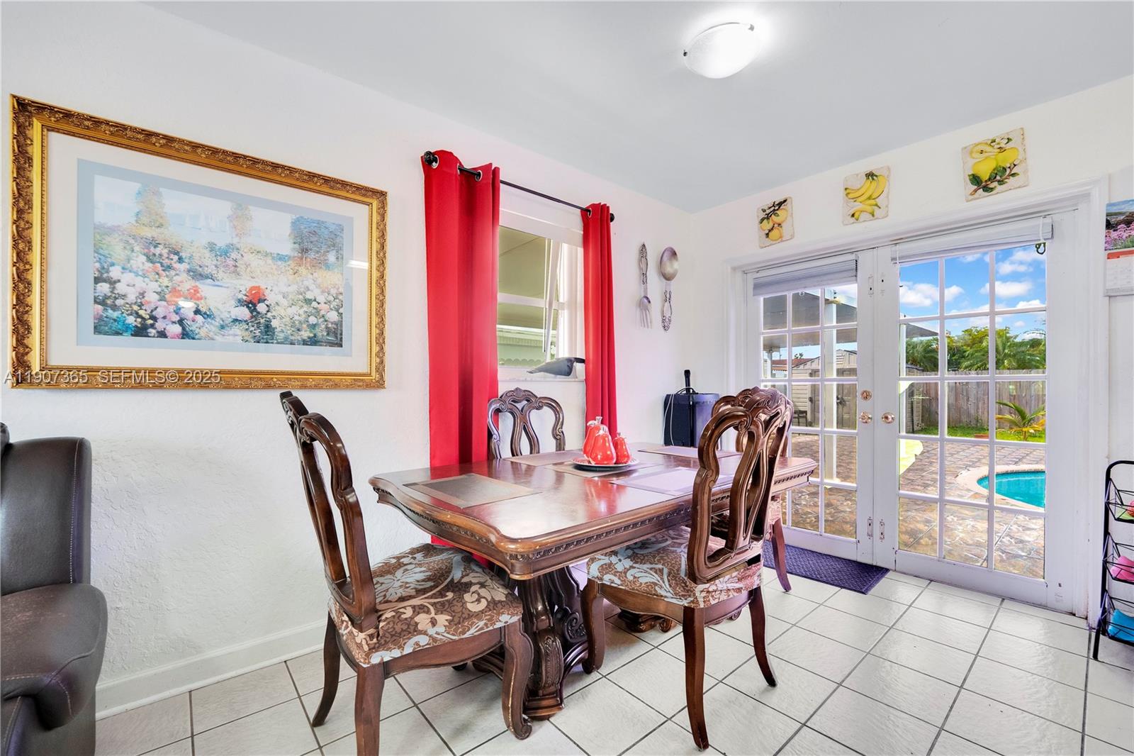 18922 Southwest 120th Court Miami, FL 33177 - Photo 4 of 29 a view of a dining room with furniture and a potted plant