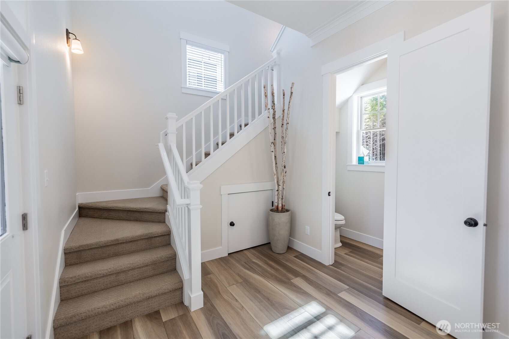 441 East Compass Street Pacific Beach, WA 98571 - Photo 13 of 26 a view of a hallway with wooden floor and entryway