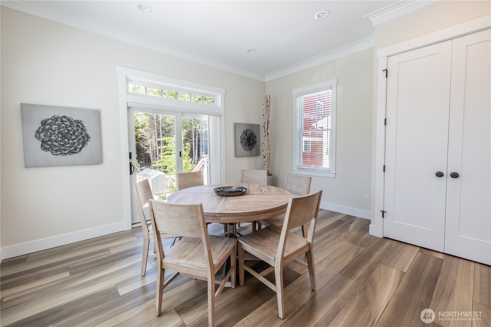 441 East Compass Street Pacific Beach, WA 98571 - Photo 13 of 27 a view of a dining room with furniture window and wooden floor