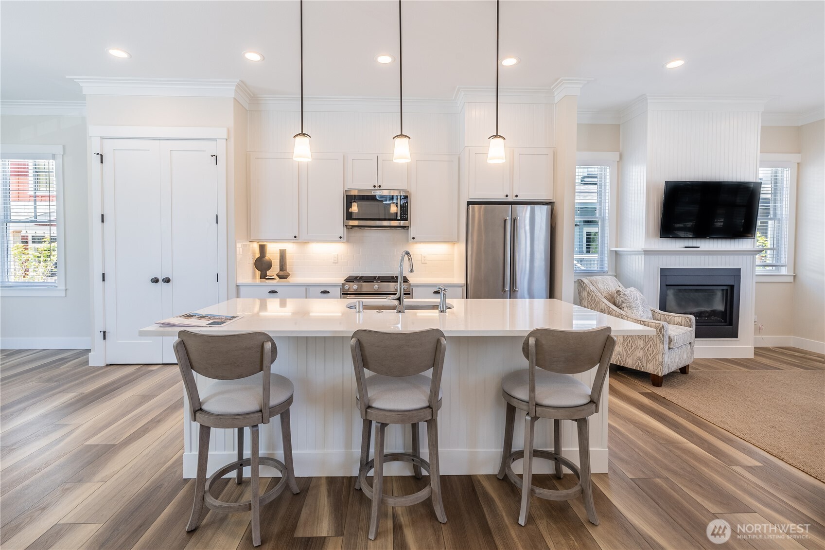 441 East Compass Street Pacific Beach, WA 98571 - Photo 9 of 27 a living room with fireplace furniture and a flat screen tv