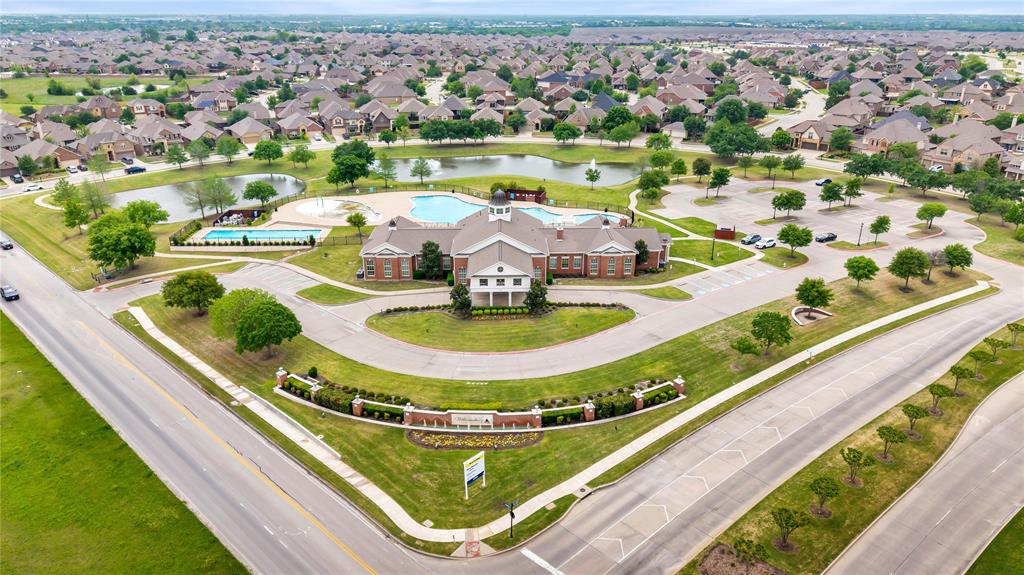 653 Bunker Hill Road Fate, TX 75189 - Photo 24 of 36 Aerial view of residential area featuring a large body of water