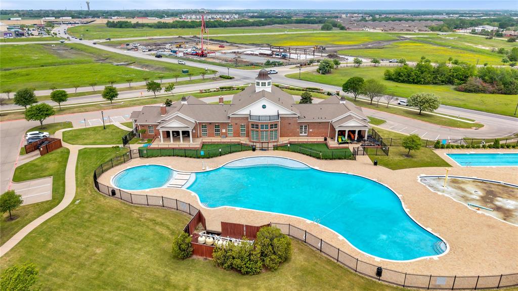 653 Bunker Hill Road Fate, TX 75189 - Photo 25 of 36 Community pool with a patio