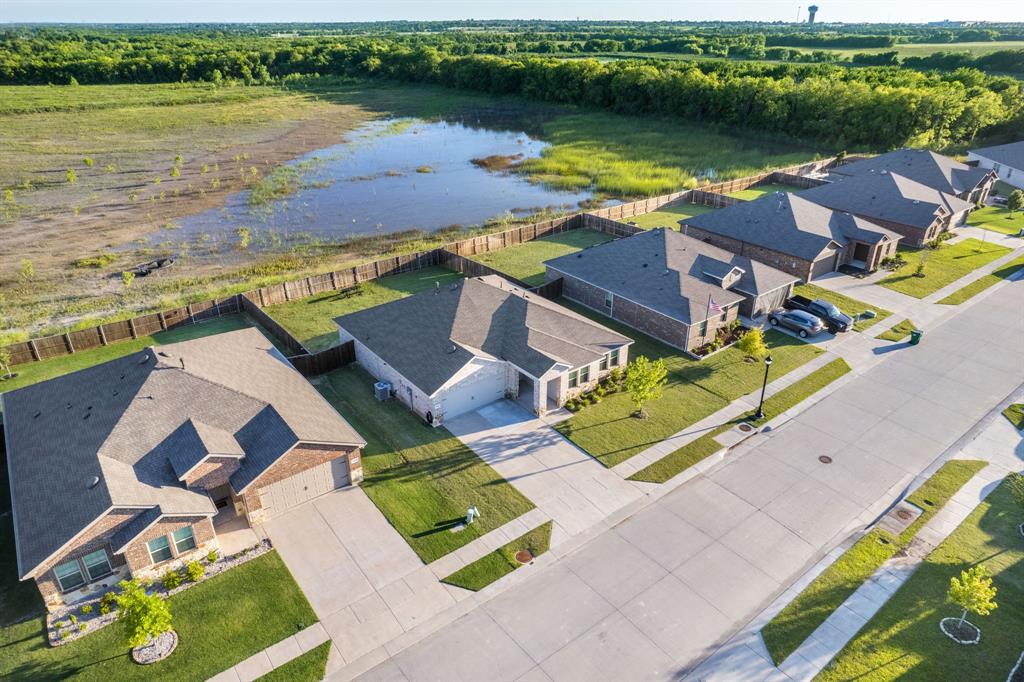 653 Bunker Hill Road Fate, TX 75189 - Photo 32 of 36 Aerial perspective of suburban area