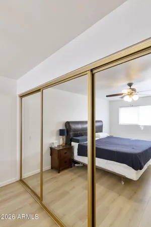 a bedroom with furniture and window