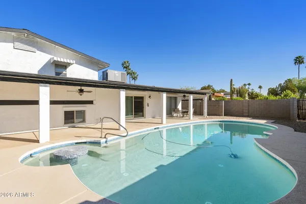front view of a house with swimming pool