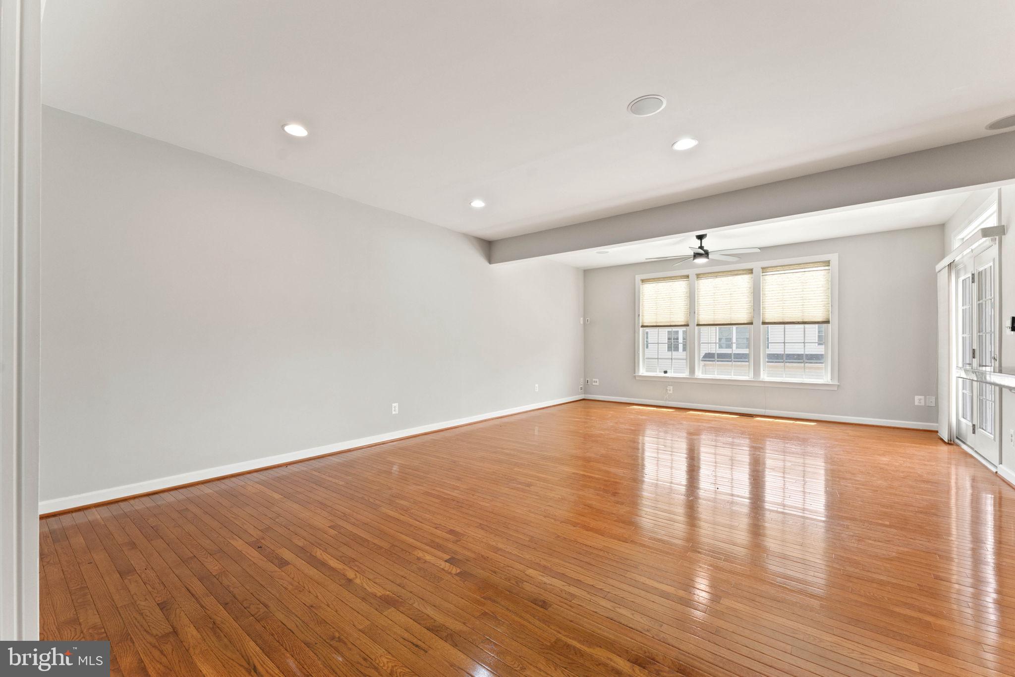 42524 Rowderbury Square Chantilly, VA 20152 - Photo 28 of 73 wooden floor in an empty room with a window