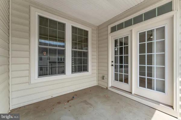 a kitchen with a sink stove top oven and refrigerator