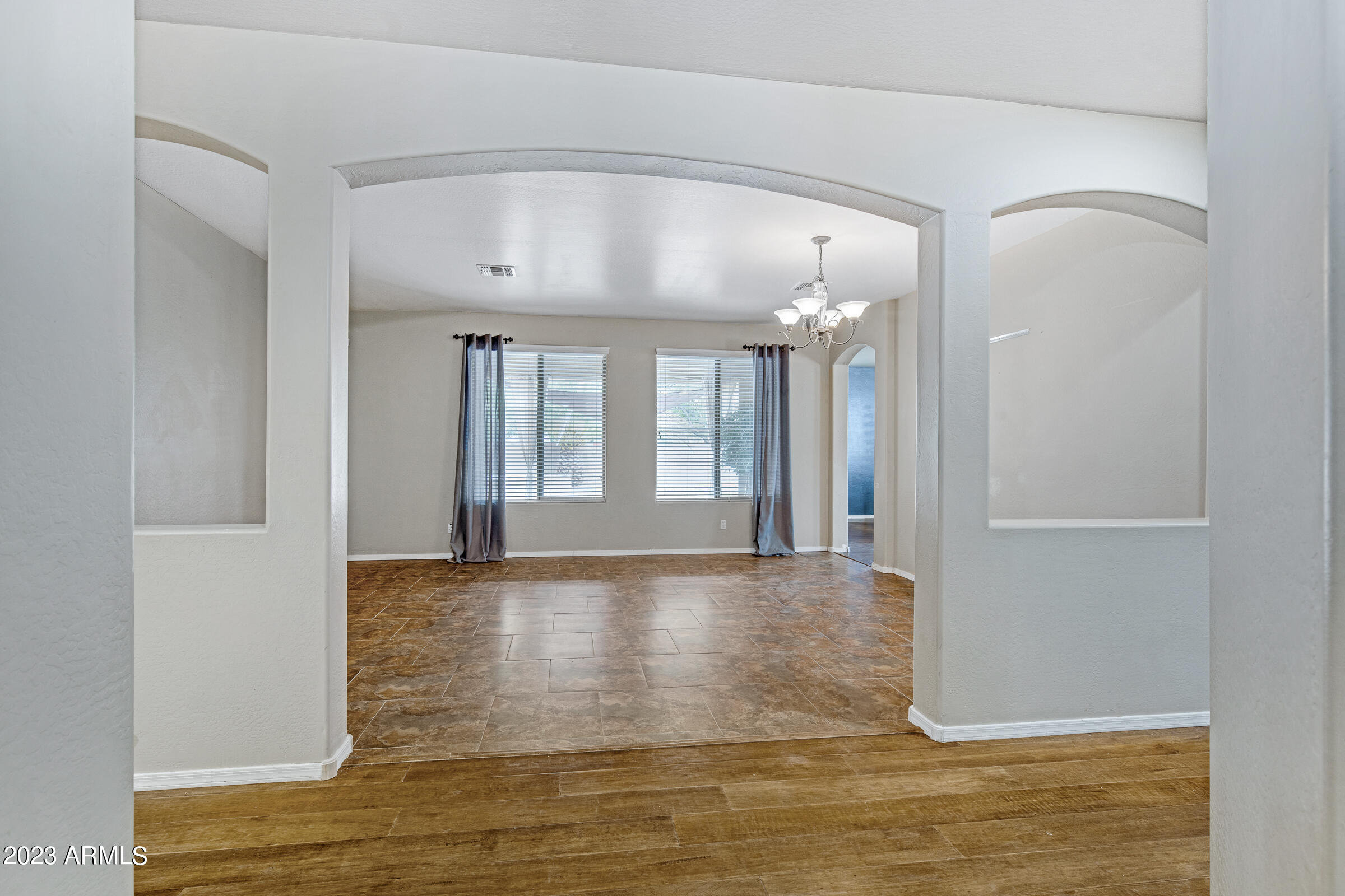 14261 West Wethersfield Road Surprise, AZ 85379 - Photo 5 of 32 Entry-Living Room