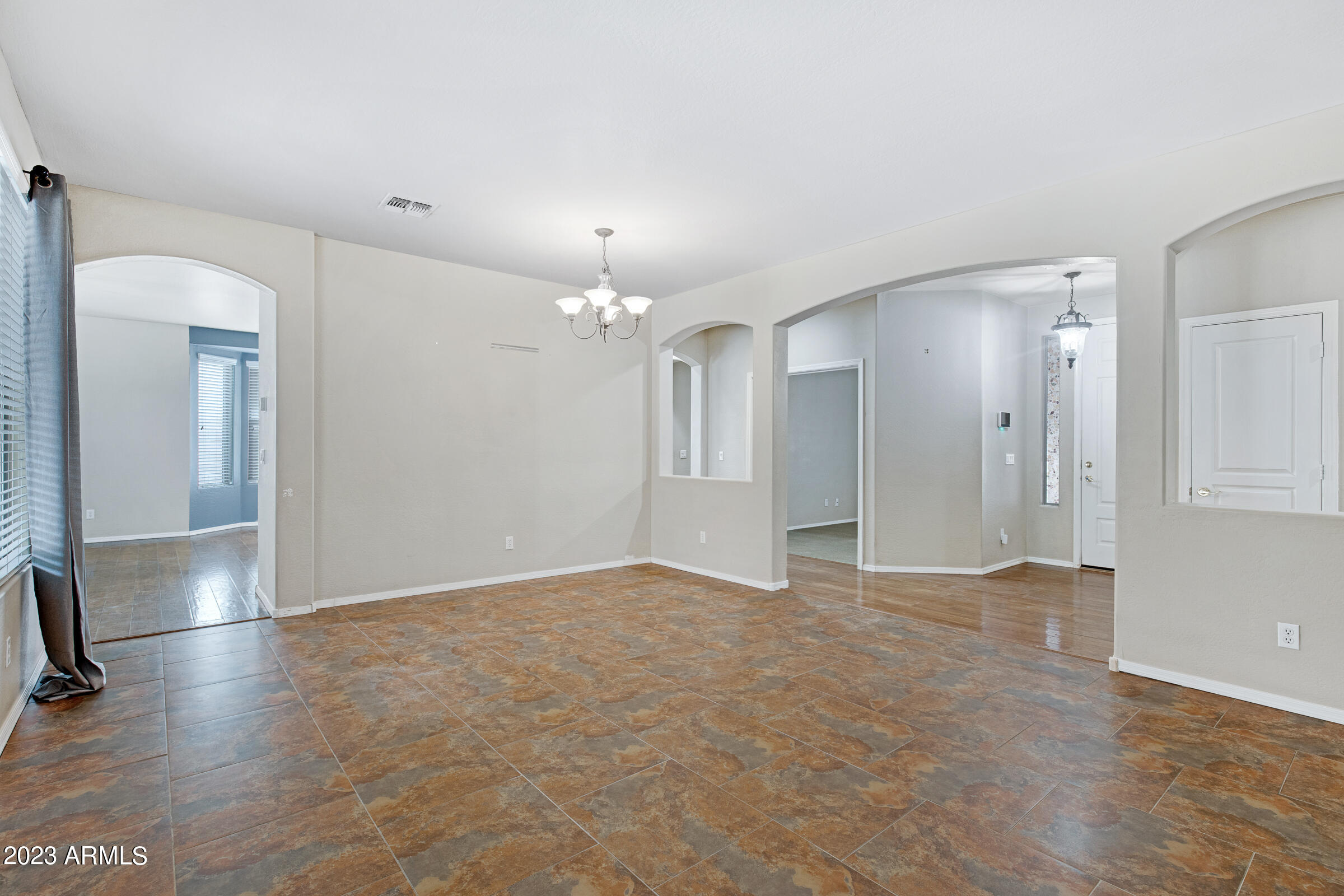 14261 West Wethersfield Road Surprise, AZ 85379 - Photo 7 of 32 Living Room
