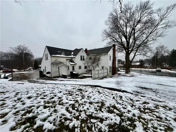 a view of a backyard of a house