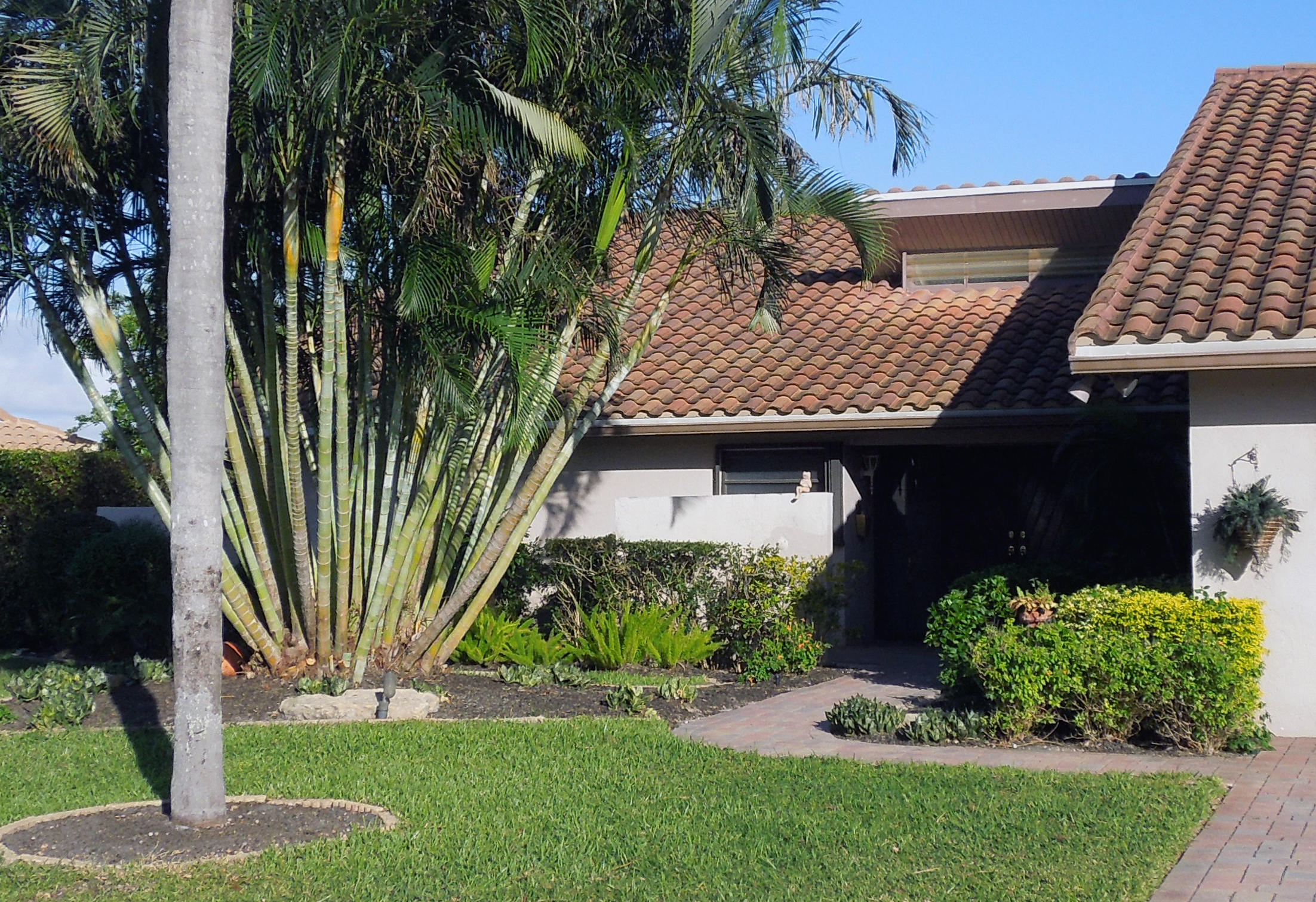 5590 Northwest 3rd Terrace Boca Raton, FL 33487 - Photo 4 of 10 FRONT SW CLOSE-UP