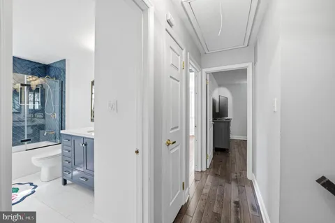 a bathroom with a sink and a shower