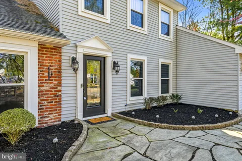 a view of a chairs and table in the house