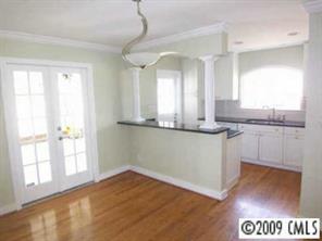 143 McAlway Road Charlotte, NC 28211 - Photo 3 of 8 a view of a kitchen with a sink and a window