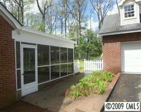 143 McAlway Road Charlotte, NC 28211 - Photo 8 of 8 a house view with a garden space