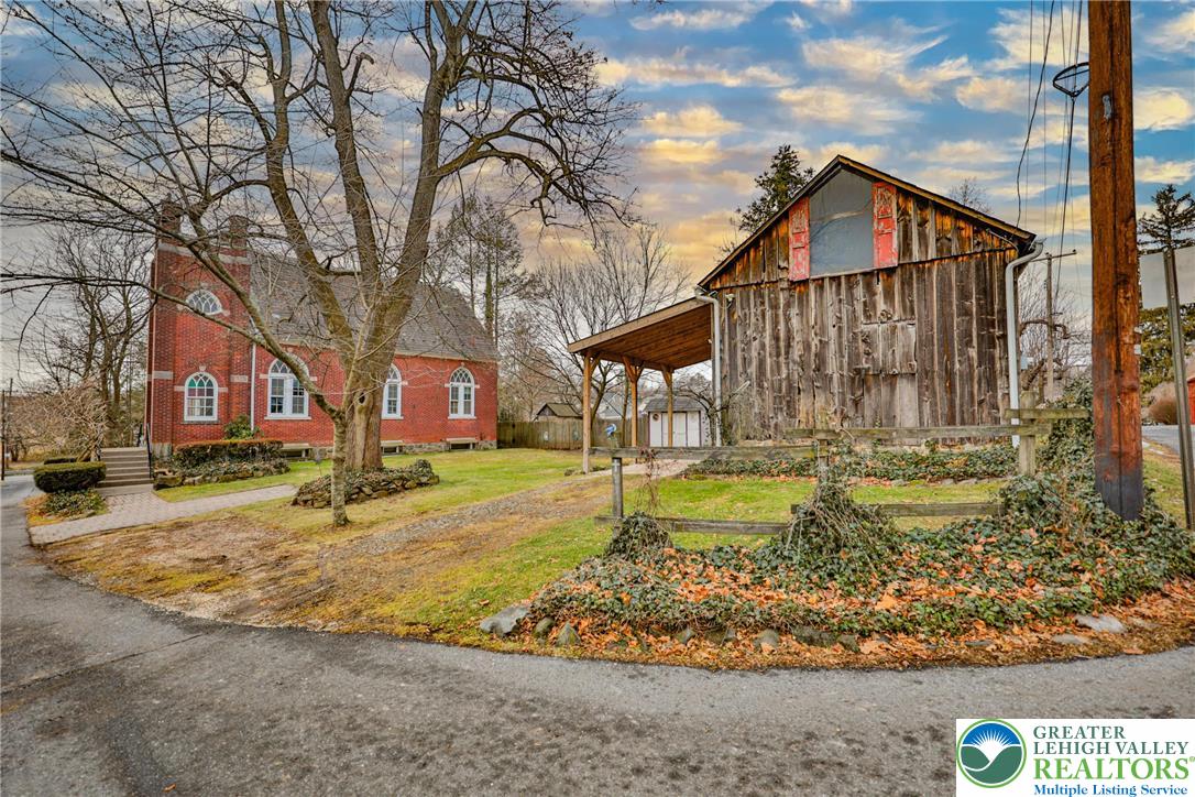 3285 Lime Street Bethlehem, PA 18020 - Photo 2 of 70 a front view of a house with garden