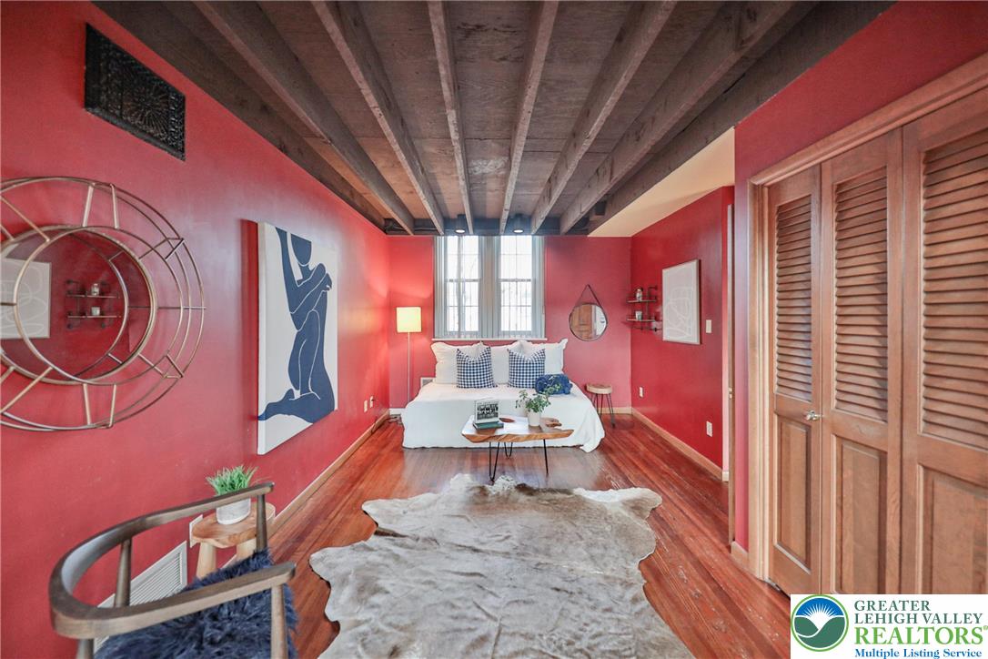 3285 Lime Street Bethlehem, PA 18020 - Photo 22 of 70 a living room with furniture a rug and a chandelier