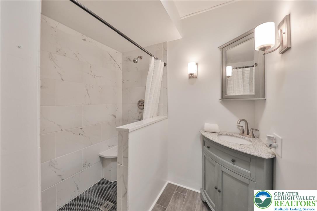 3285 Lime Street Bethlehem, PA 18020 - Photo 47 of 70 a bathroom with a sink a toilet and shower