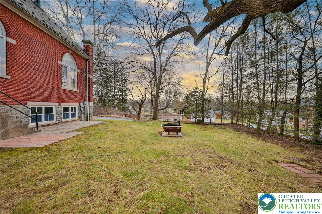 3285 Lime Street Bethlehem, PA 18020 - Photo 52 of 70 a view of swimming pool with lawn chairs and plants