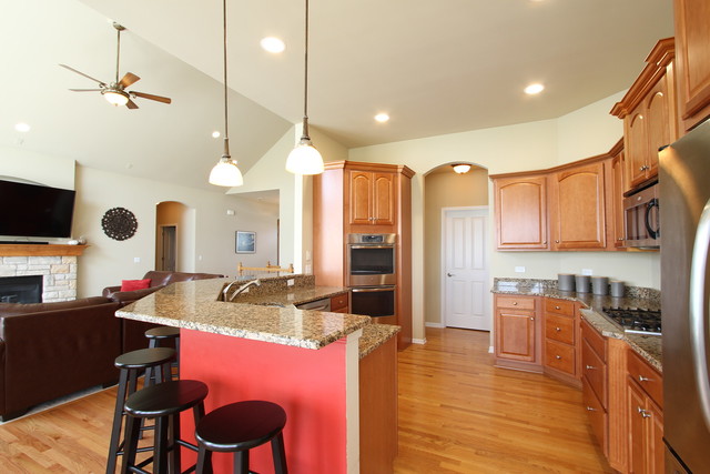 792 Ridgeview Lane Sugar Grove, IL 60554 - Photo 14 of 29 a kitchen with stainless steel appliances granite countertop a stove a sink and a refrigerator