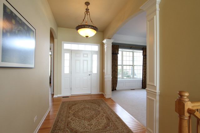 792 Ridgeview Lane Sugar Grove, IL 60554 - Photo 5 of 29 a view of hallway with a front door and wooden floor