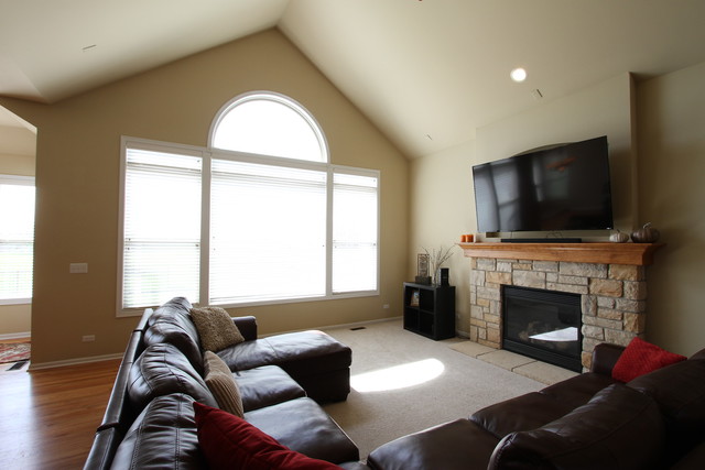 792 Ridgeview Lane Sugar Grove, IL 60554 - Photo 10 of 29 a living room with furniture and a flat screen tv