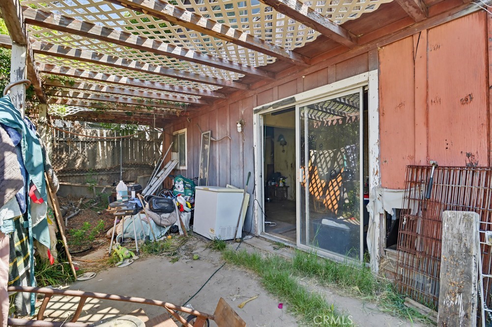 736 Sacramento Avenue Spring Valley, CA 91977 - Photo 26 of 33 a view of a patio with table and chairs