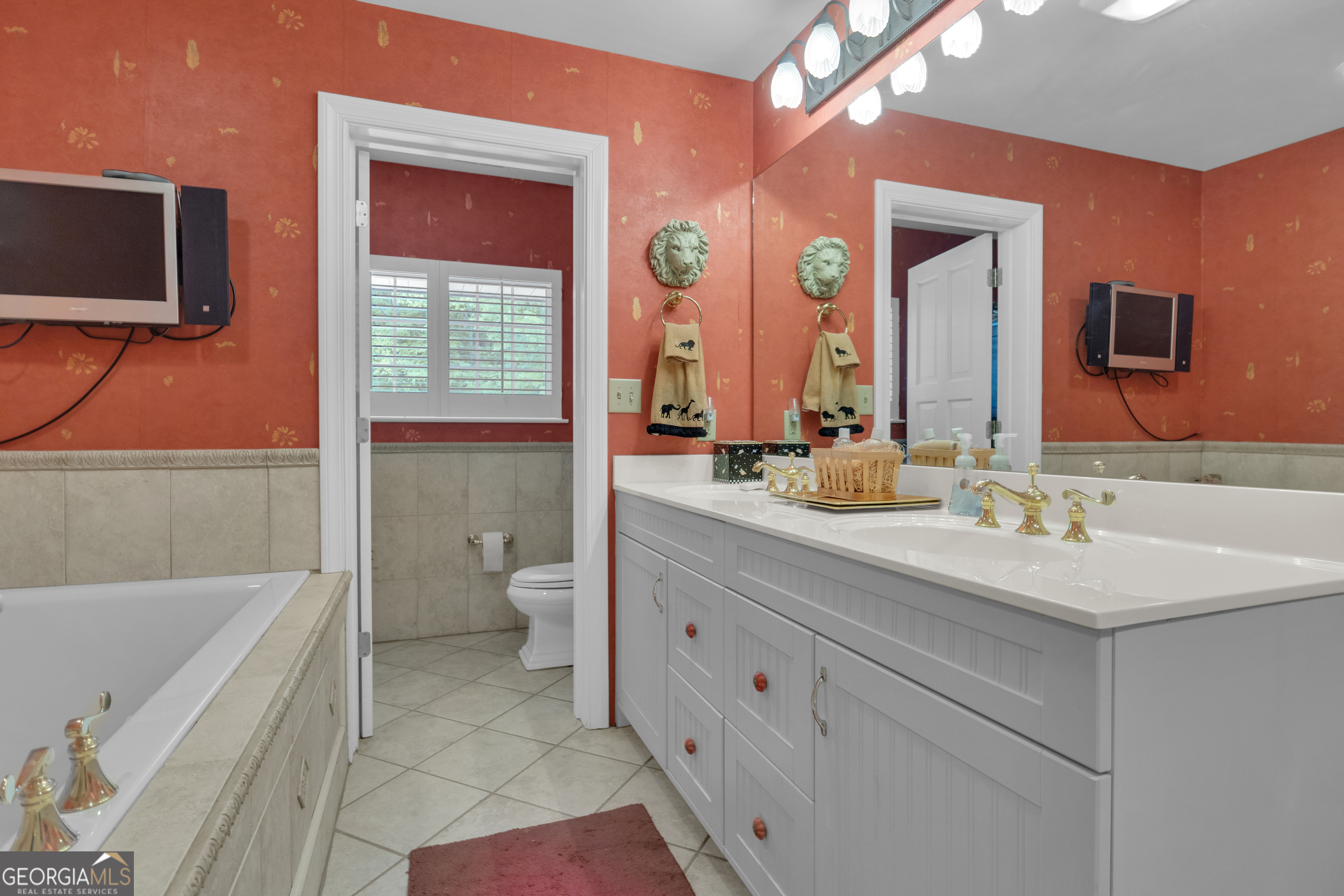14803 Woolsey Road Hampton, GA 30228 - Photo 111 of 142 a bathroom with a double vanity sink toilet and shower