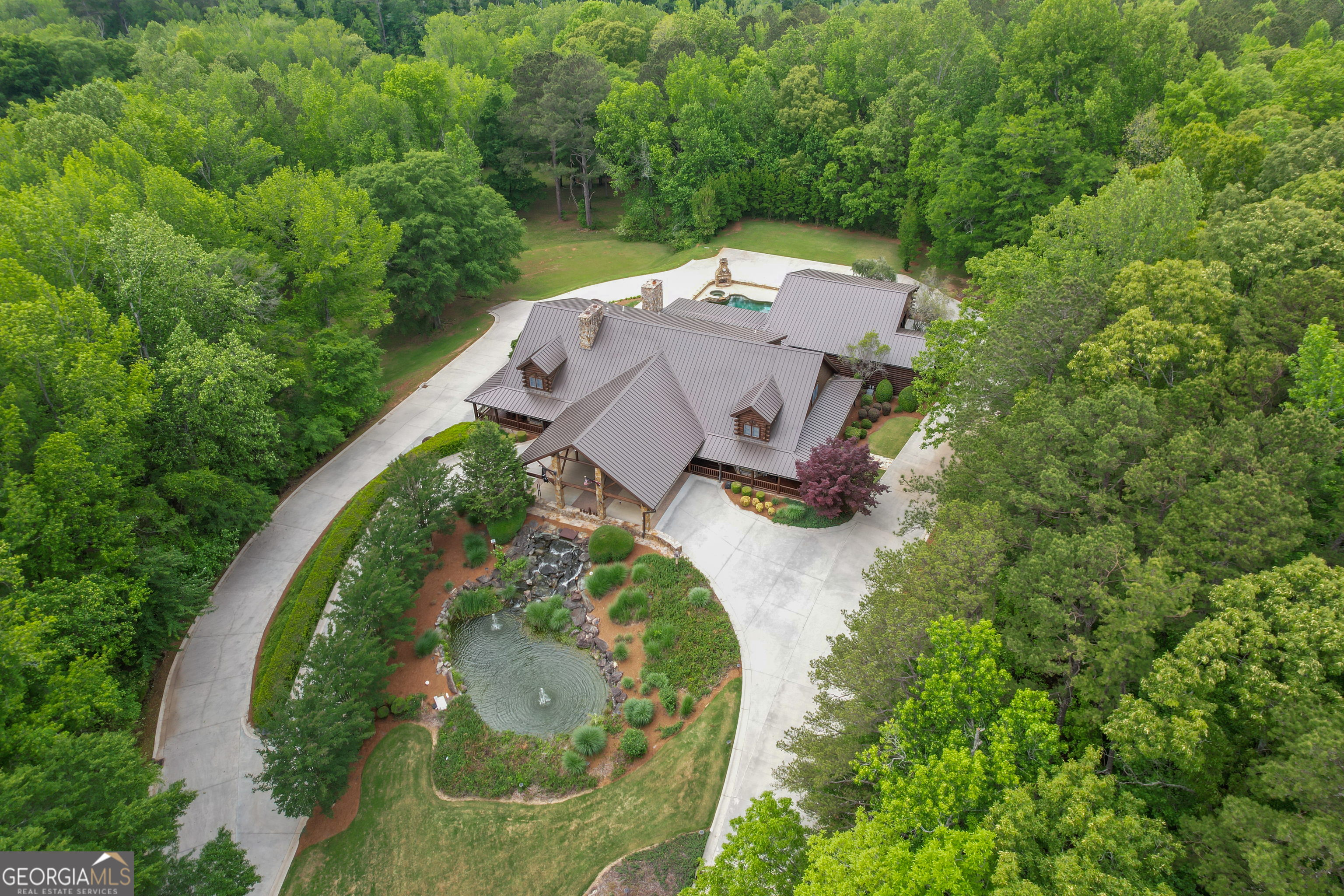 14803 Woolsey Road Hampton, GA 30228 - Photo 139 of 142 an aerial view of a house with outdoor space and trees all around