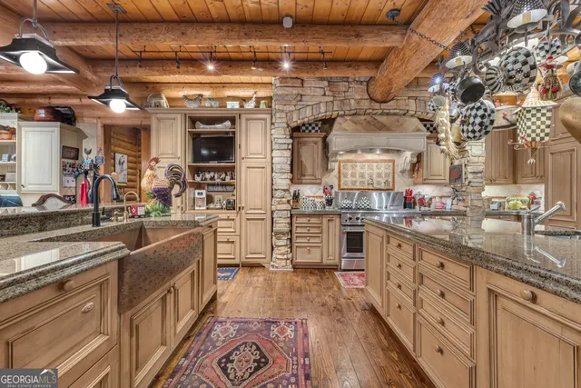a bathroom with a sink shower and a mirror