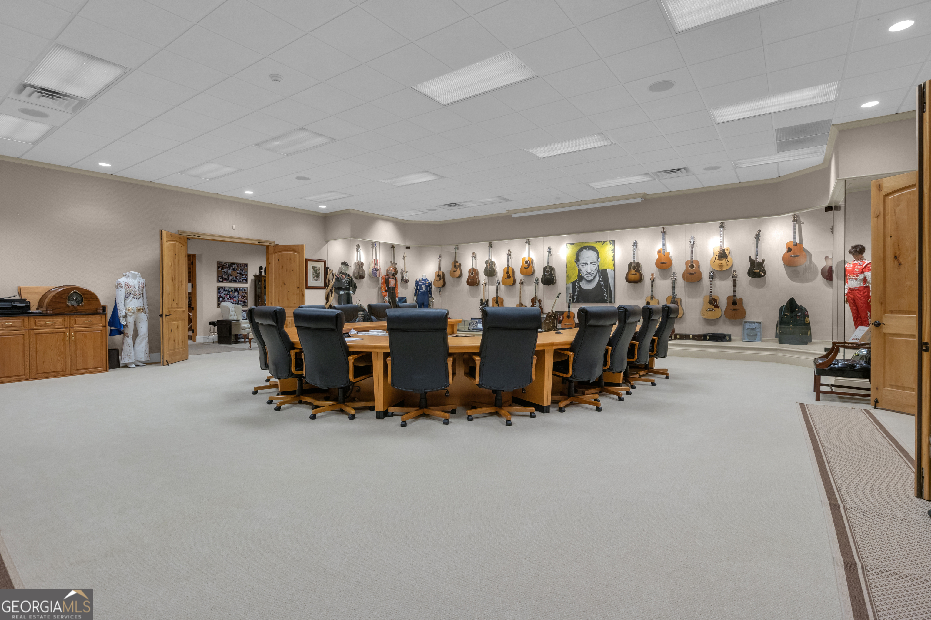 14803 Woolsey Road Hampton, GA 30228 - Photo 88 of 142 a room with gym equipment and a large window