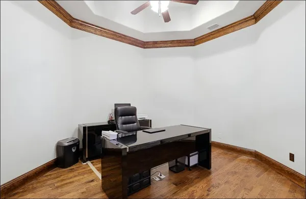 a view of a workspace with furniture