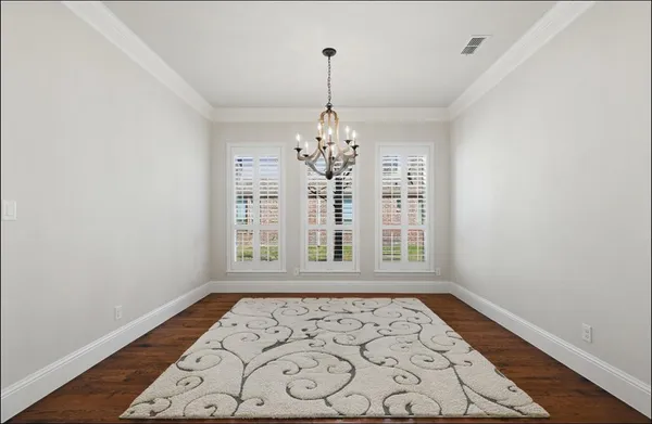 a view of a room with windows