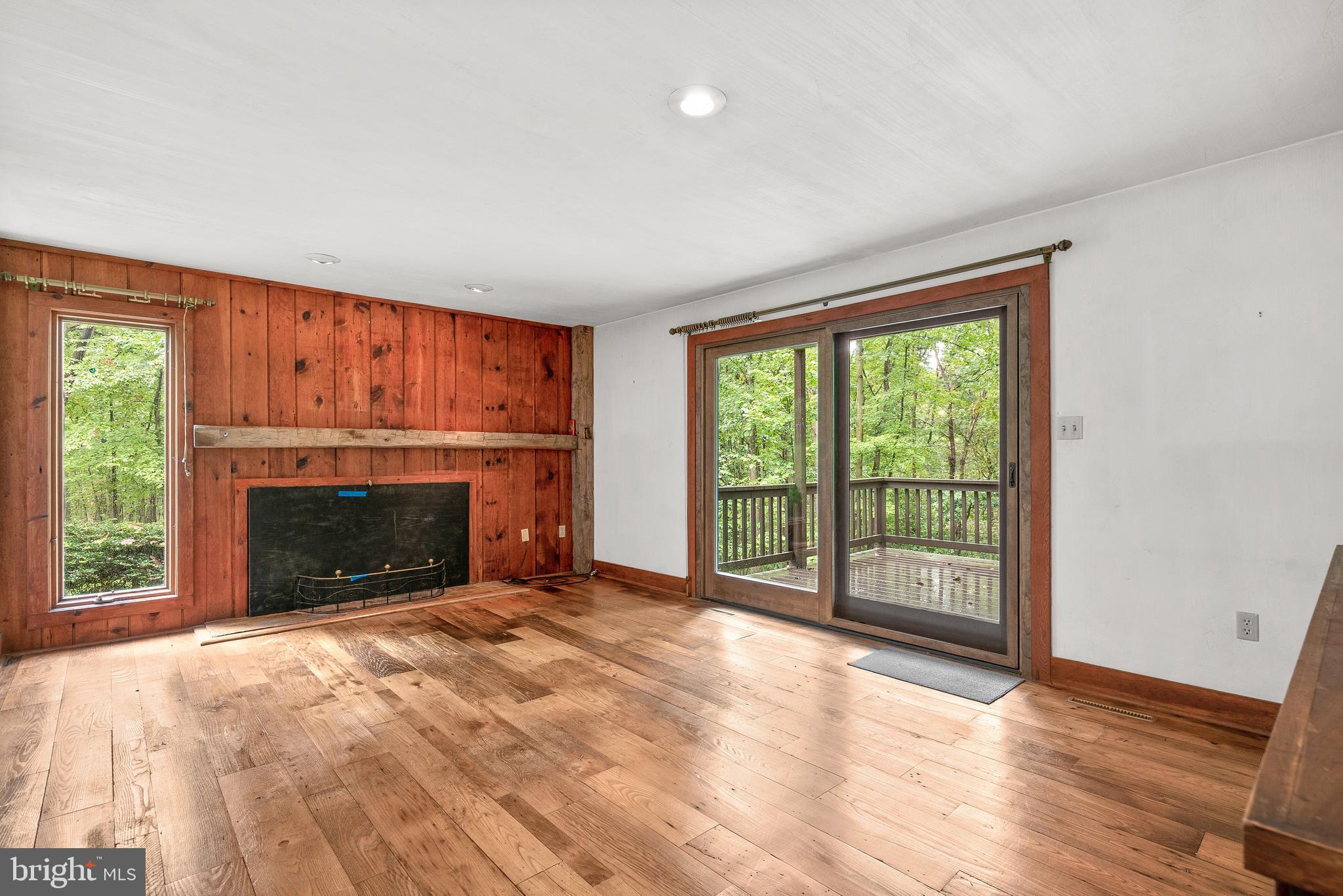 7335 Dance Hall Road Frederick, MD 21701 - Photo 6 of 54 Living Room with Sliders to Deck