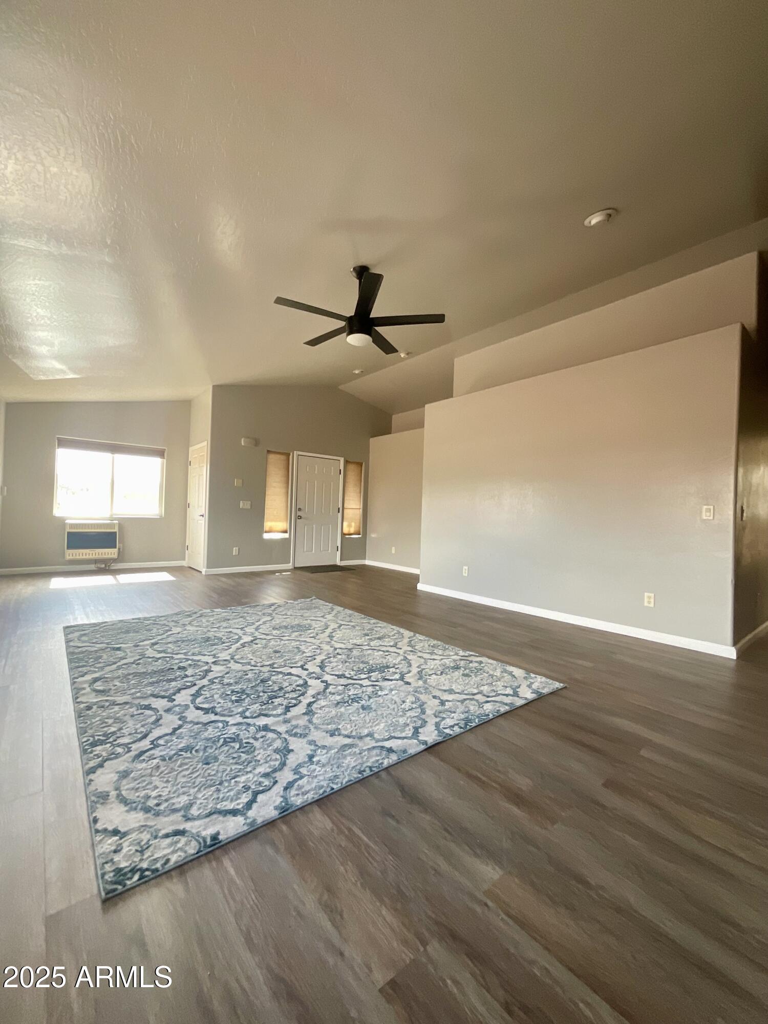 242 County Road Concho, AZ 85924 - Photo 15 of 63 a view of empty room and wooden floor