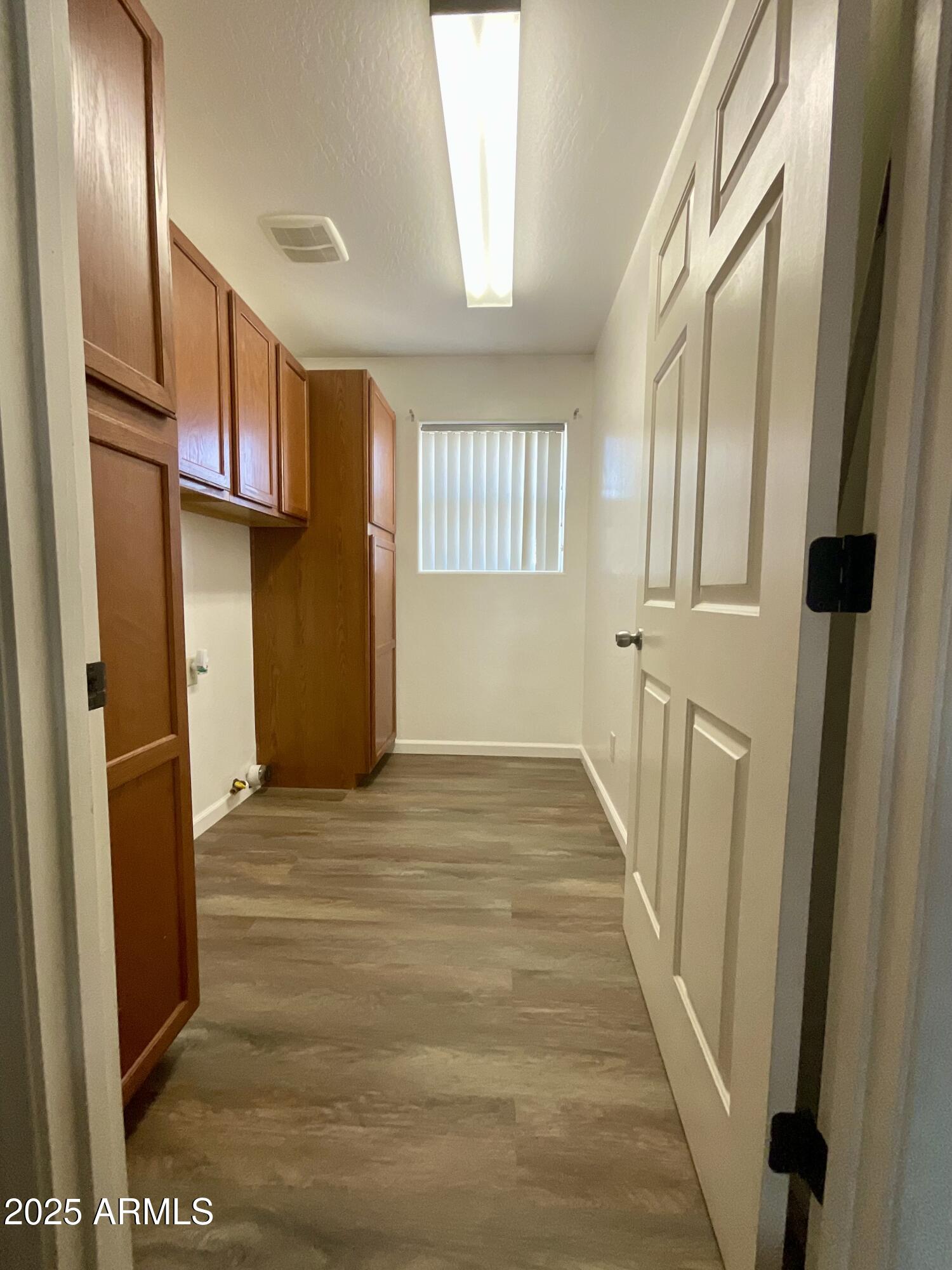 242 County Road Concho, AZ 85924 - Photo 18 of 63 a view of a hallway with wooden floor and staircase
